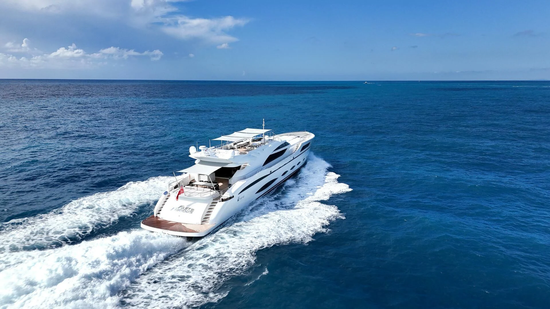a boat on the water aboard FAST & FURIOUS Yacht for Charter