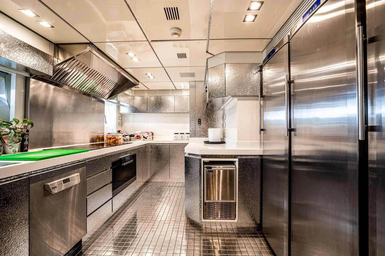 a kitchen with stainless steel appliances aboard FAST & FURIOUS Yacht for Charter