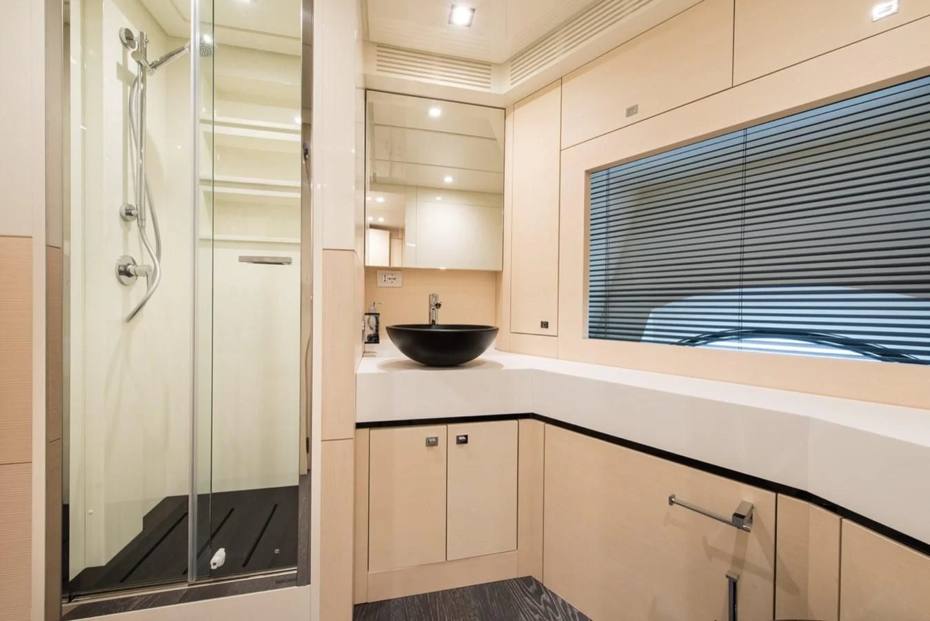 a kitchen with a large glass shower unit aboard FAST & FURIOUS Yacht for Charter