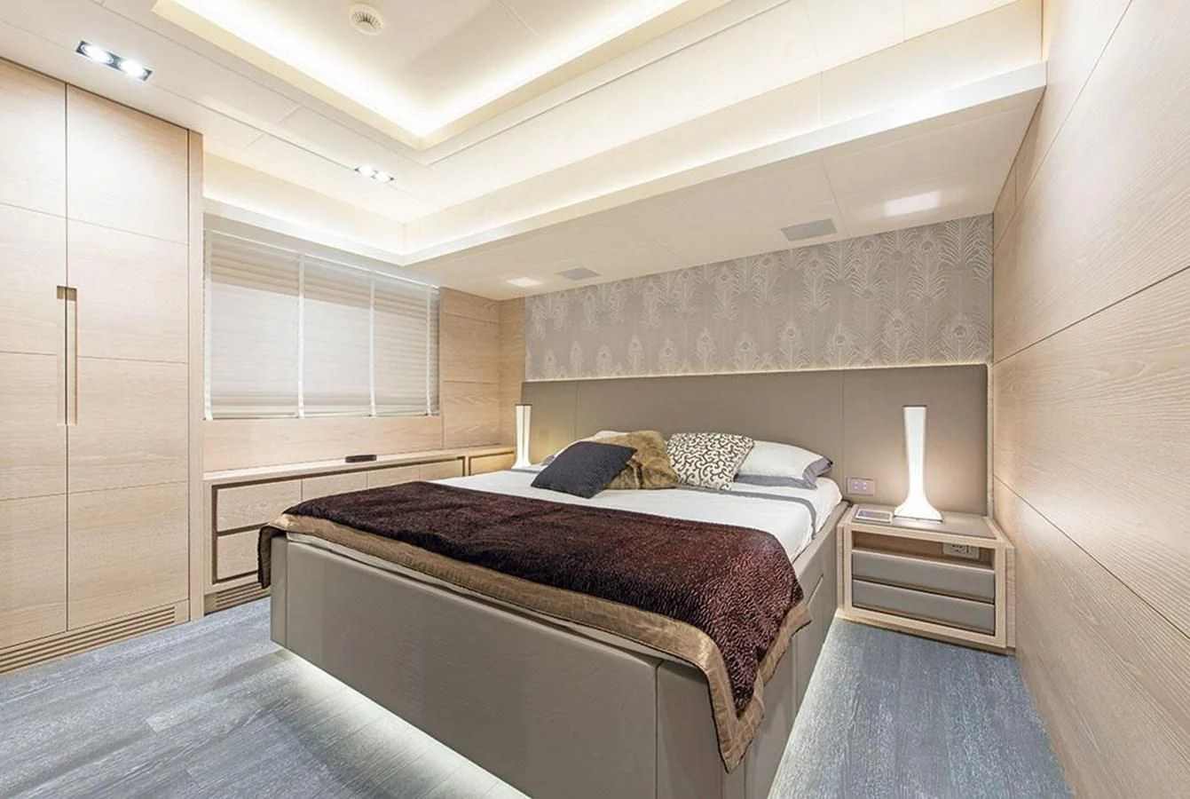 a bedroom with two beds aboard FAST & FURIOUS Yacht for Charter