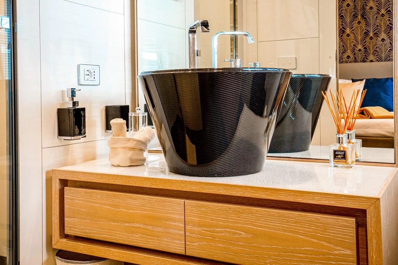 a black and brown hat on a counter top aboard FAST & FURIOUS Yacht for Charter