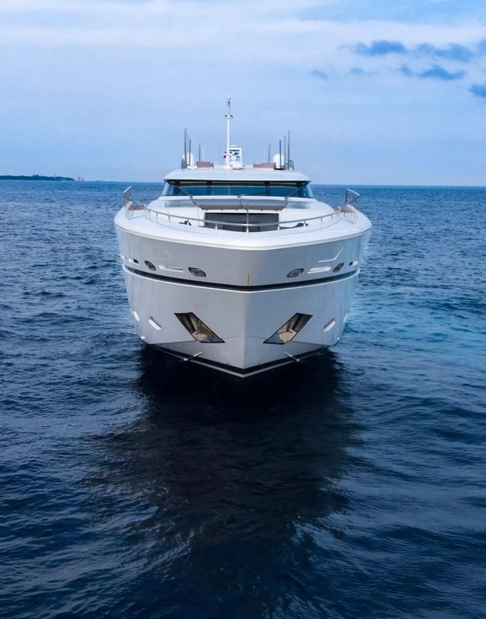 a white boat in the water aboard FAST & FURIOUS Yacht for Charter