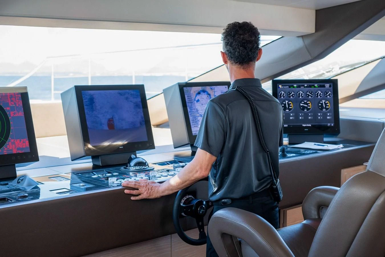 a man using a virtual reality device aboard FAST & FURIOUS Yacht for Charter