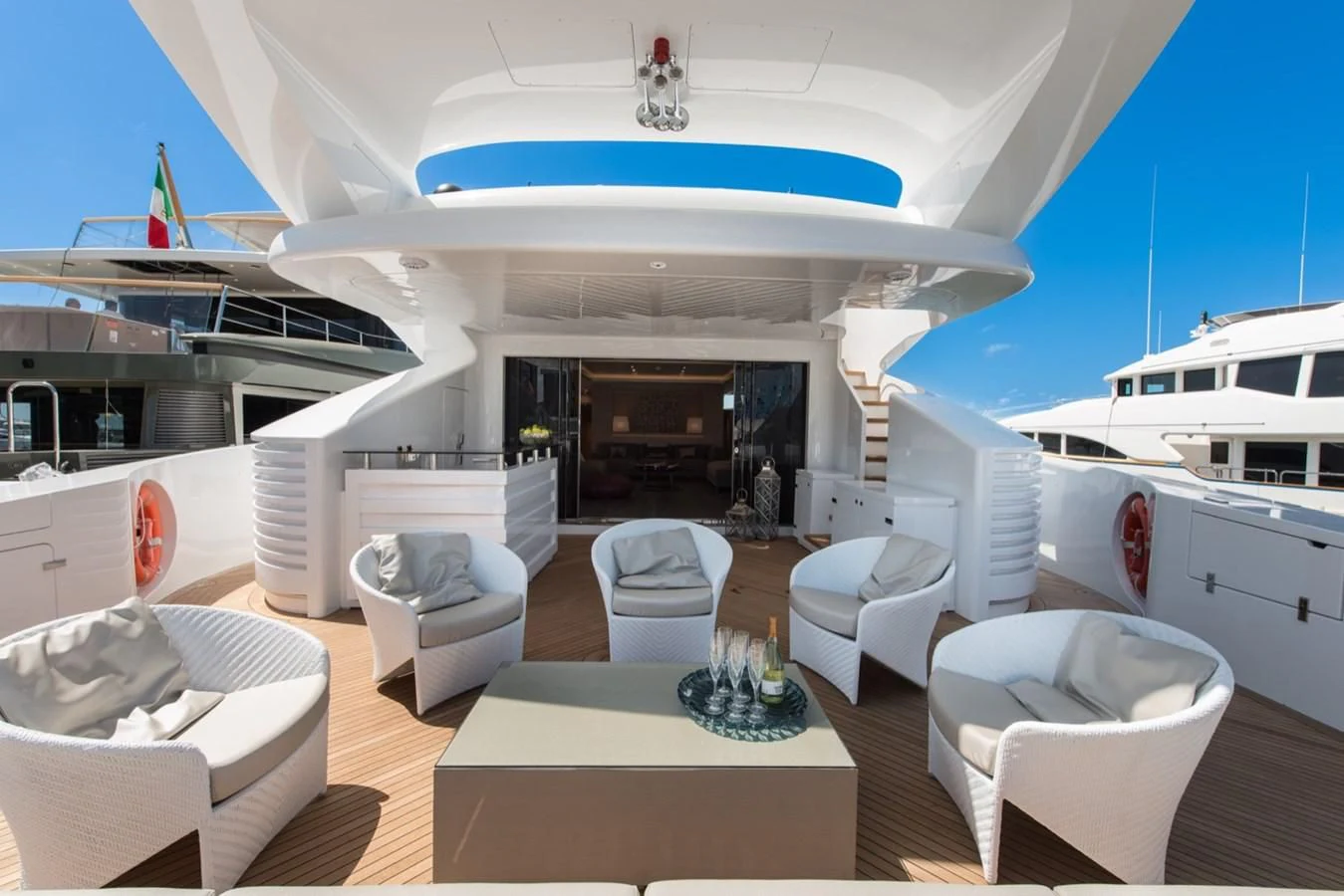 a room with a large white yacht aboard FAST & FURIOUS Yacht for Charter