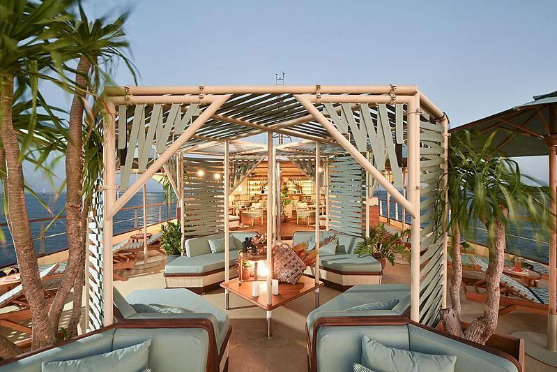 a house with a deck and a pool aboard KUDANIL EXPLORER Yacht for Sale