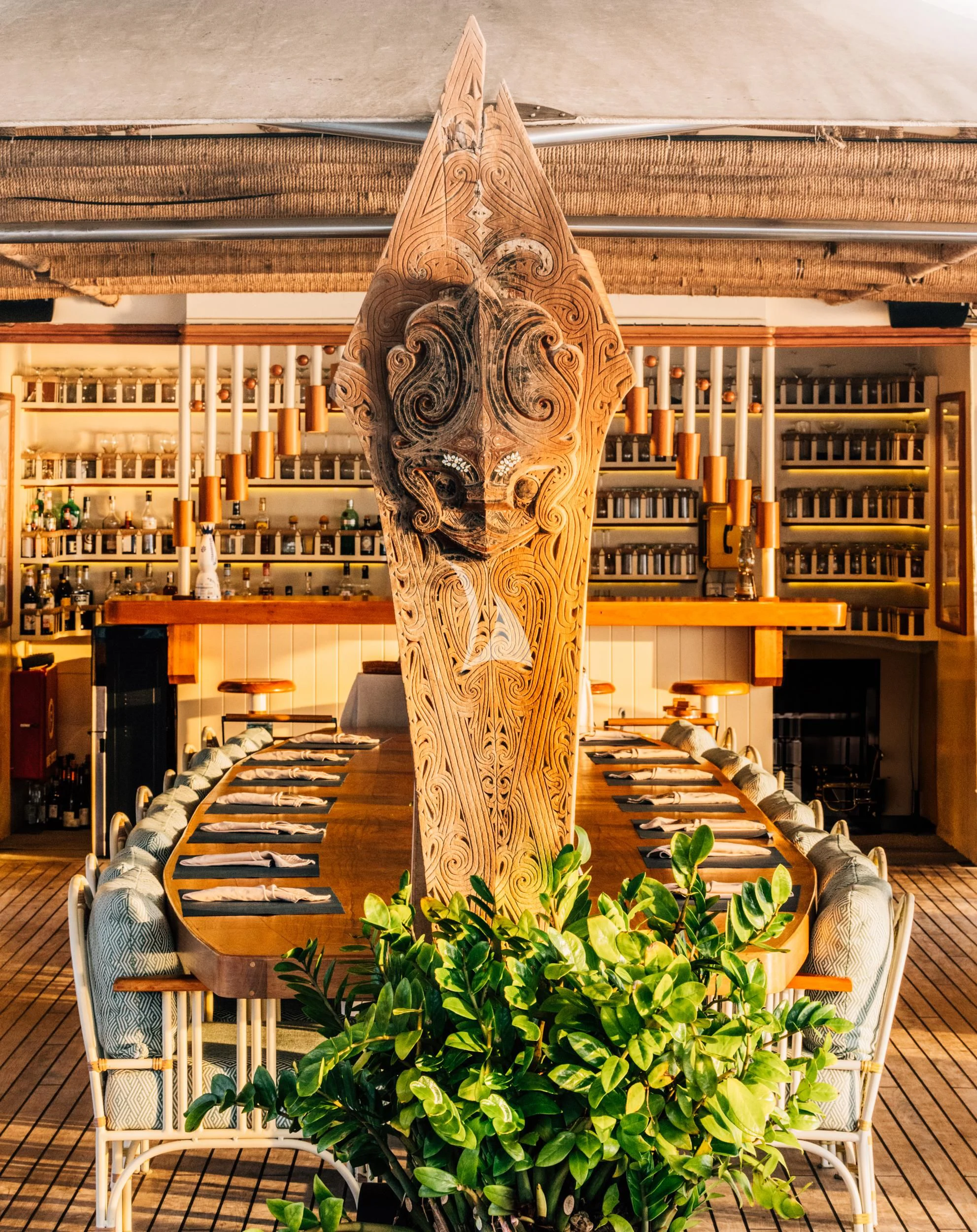 a wood sculpture in a library aboard KUDANIL EXPLORER Yacht for Sale