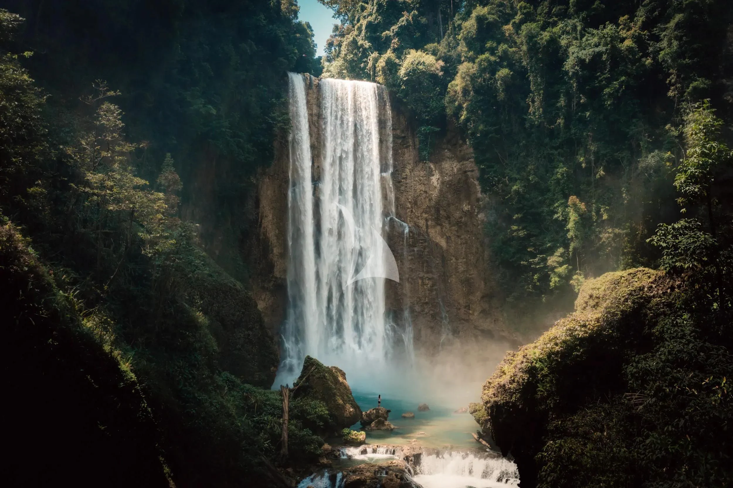 a waterfall in a forest aboard KUDANIL EXPLORER Yacht for Sale