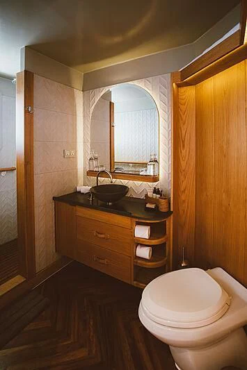 a bathroom with a sink and a toilet aboard KUDANIL EXPLORER Yacht for Sale