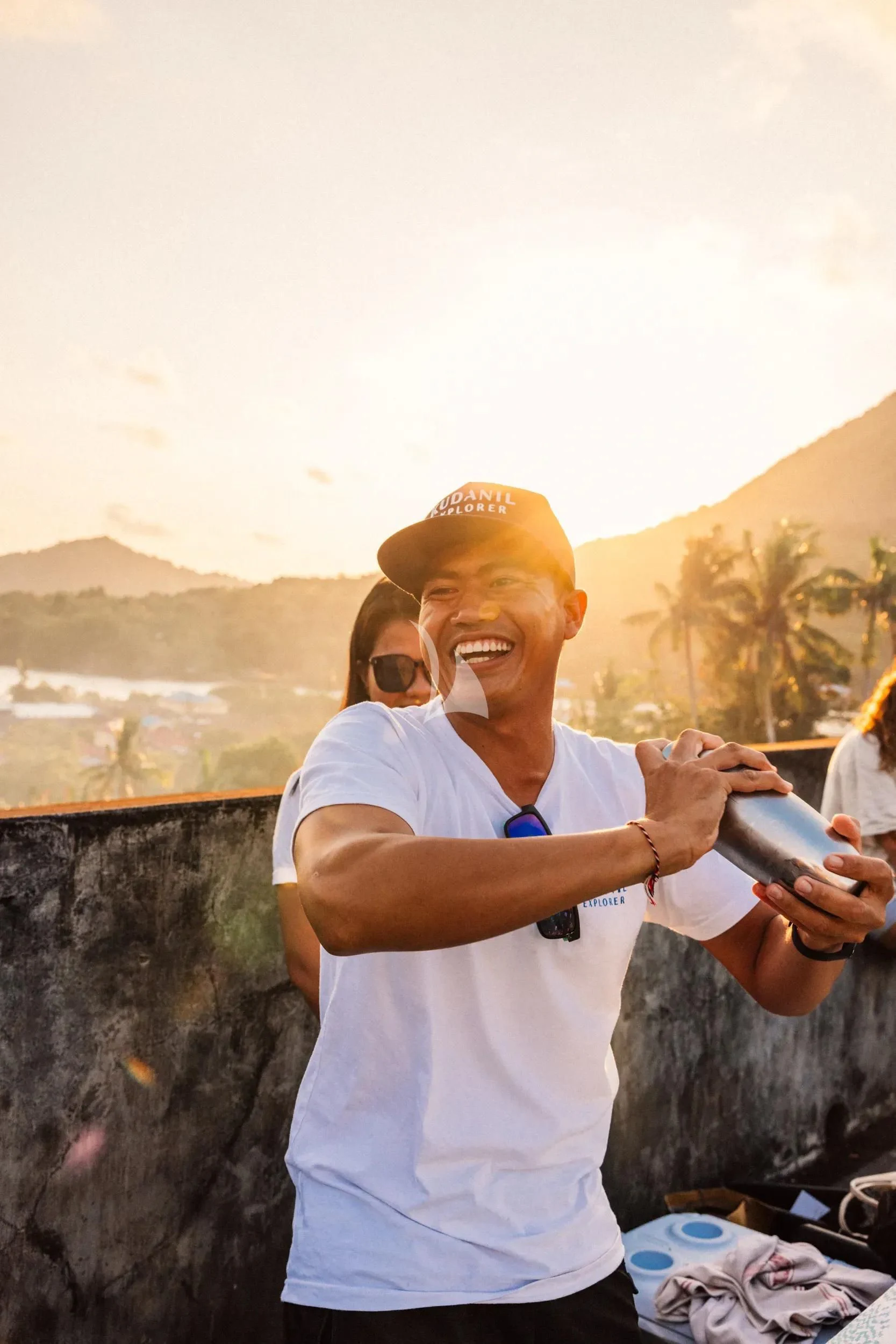 a man holding a phone aboard KUDANIL EXPLORER Yacht for Sale