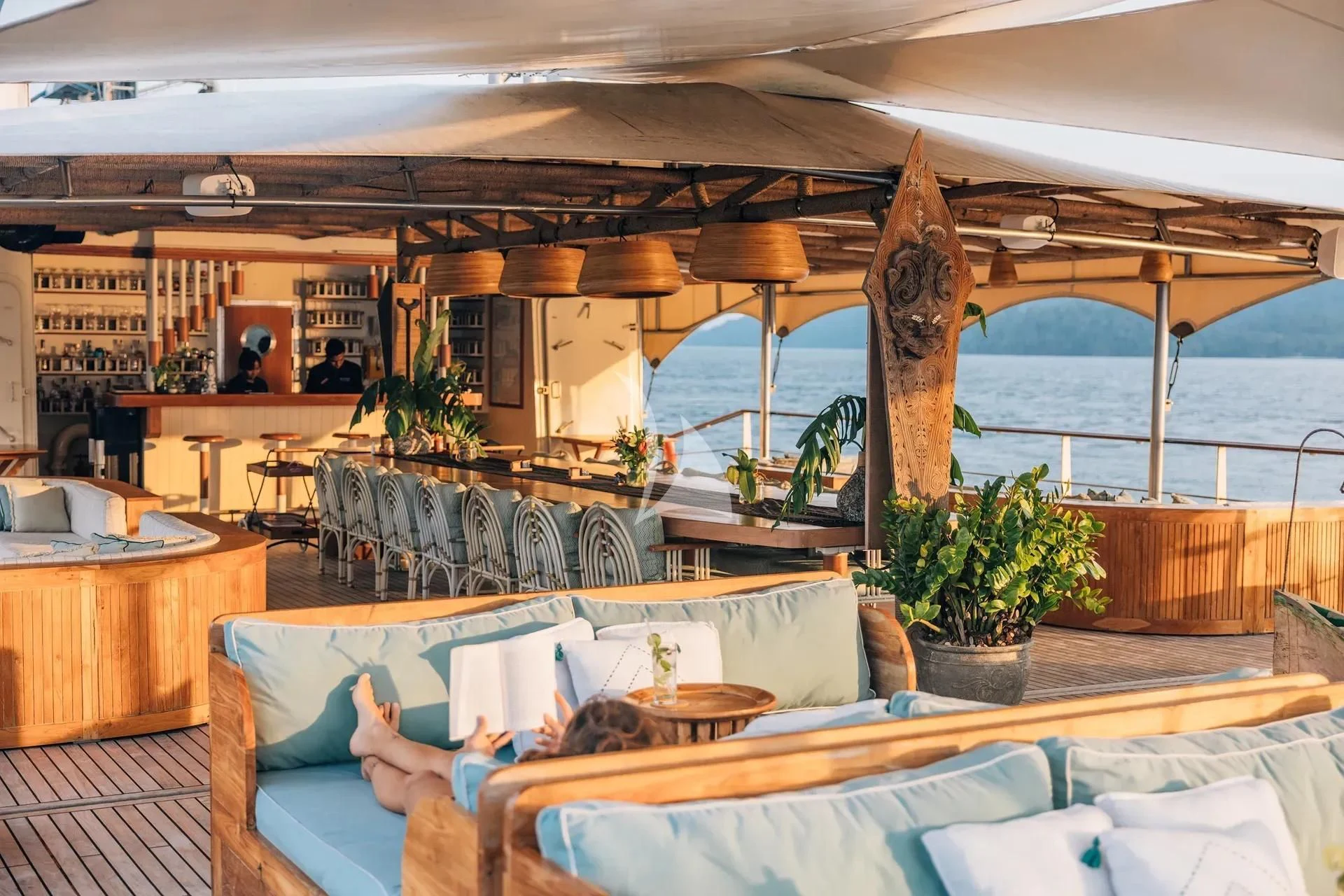 a room with a large window and a view of the ocean aboard KUDANIL EXPLORER Yacht for Sale