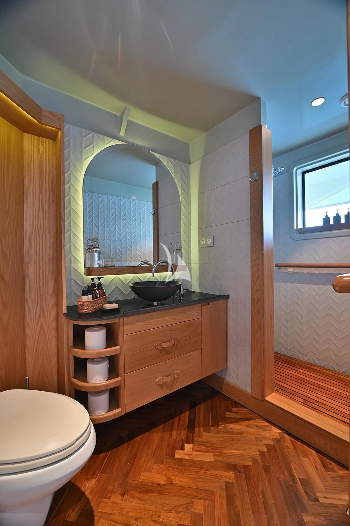 a bathroom with a sink and a toilet aboard KUDANIL EXPLORER Yacht for Sale