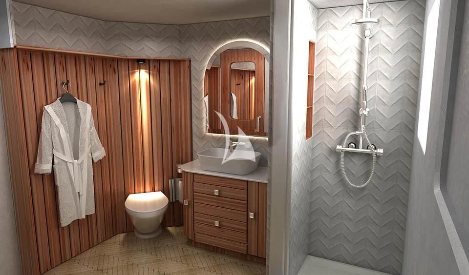 a bathroom with a toilet and sink aboard KUDANIL EXPLORER Yacht for Sale