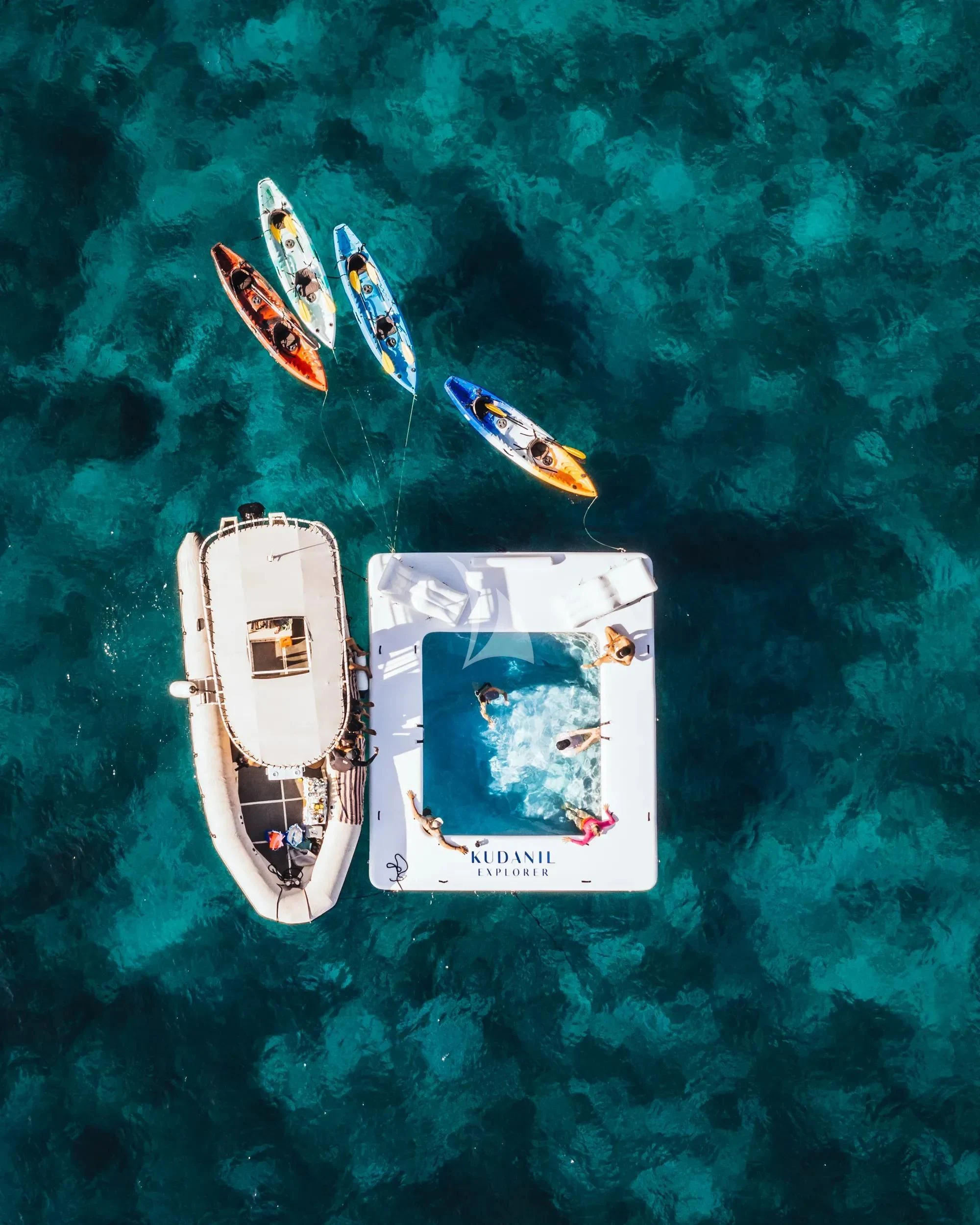 a group of boats in the water aboard KUDANIL EXPLORER Yacht for Sale