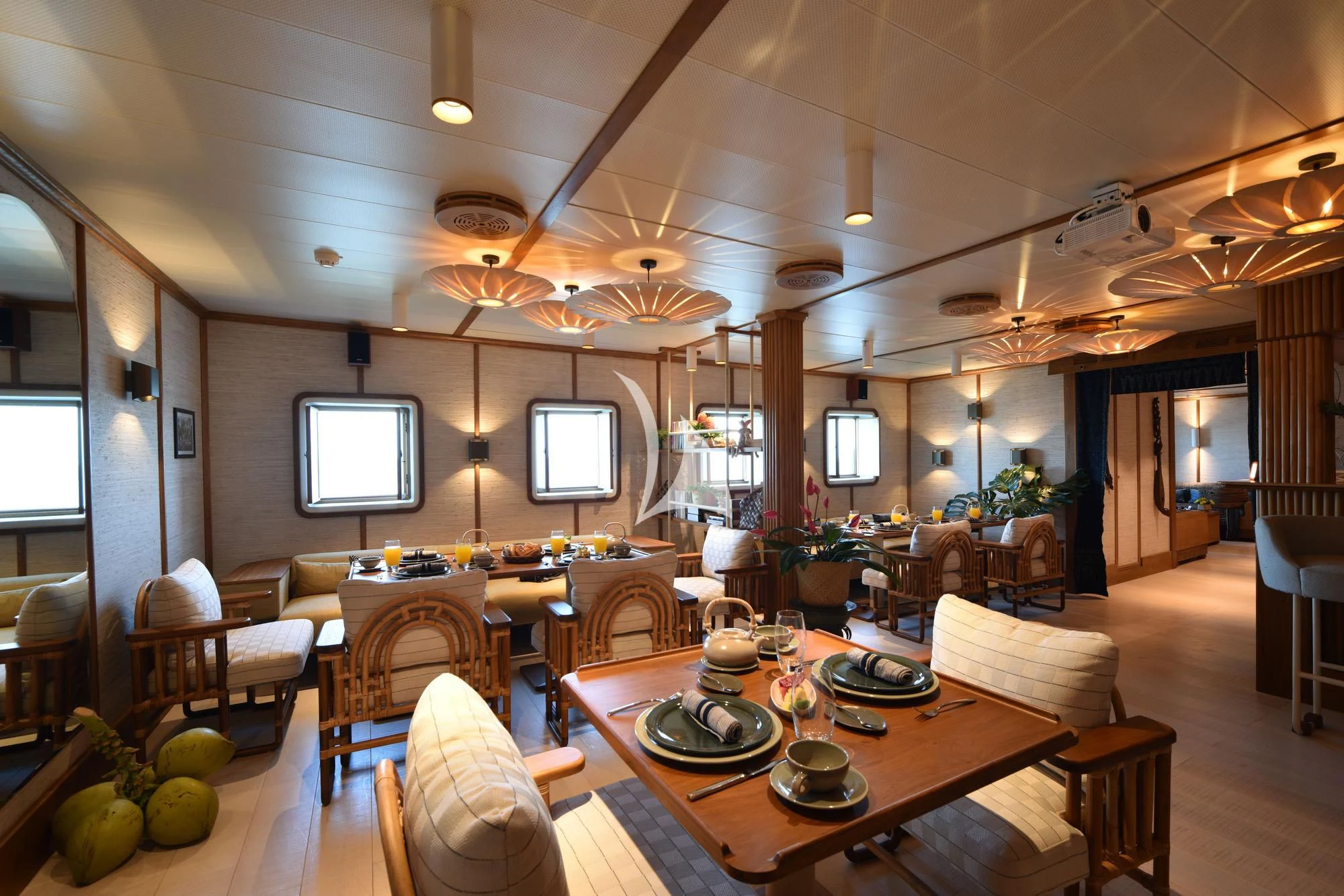 a room with a table and chairs aboard KUDANIL EXPLORER Yacht for Sale