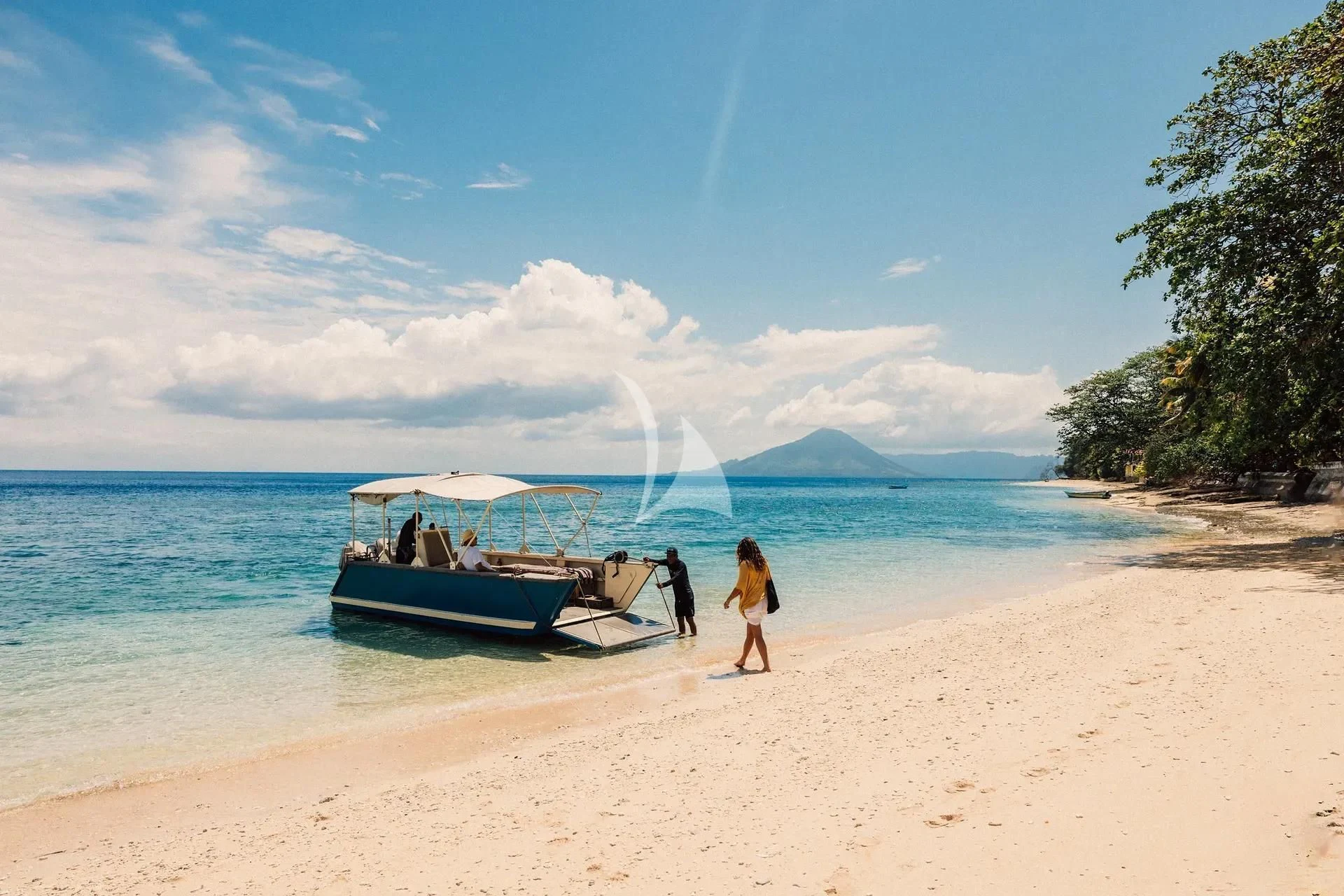 people walking on a beach aboard KUDANIL EXPLORER Yacht for Sale