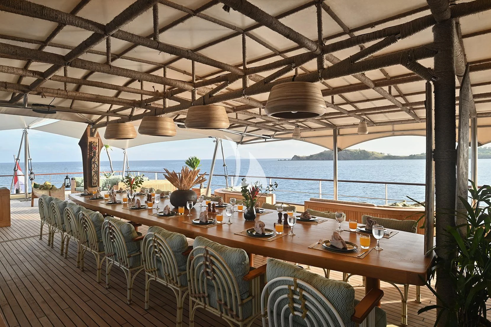 a table set for a dinner aboard KUDANIL EXPLORER Yacht for Sale