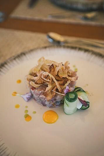 a plate of food aboard KUDANIL EXPLORER Yacht for Sale