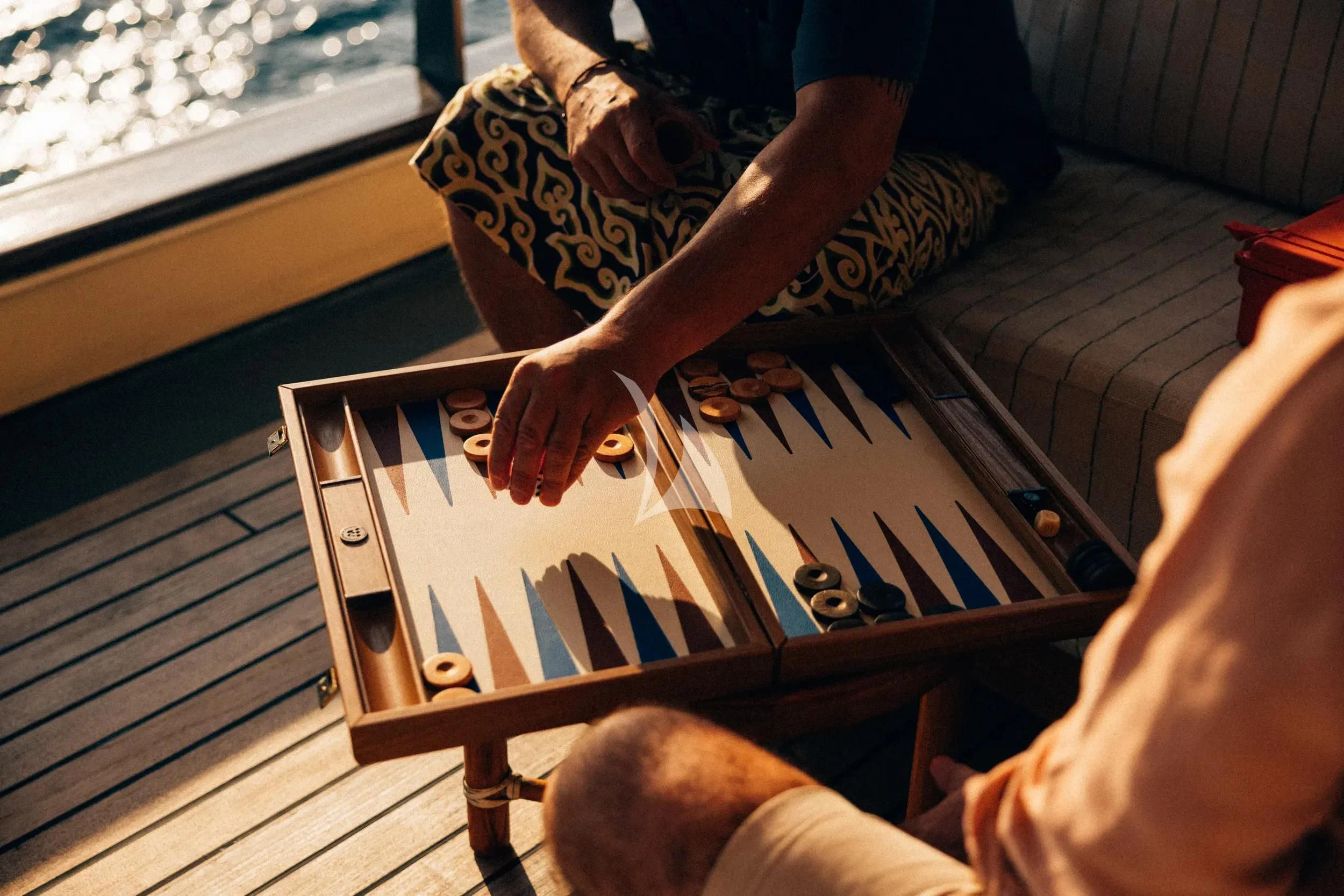 a person playing a guitar aboard KUDANIL EXPLORER Yacht for Sale