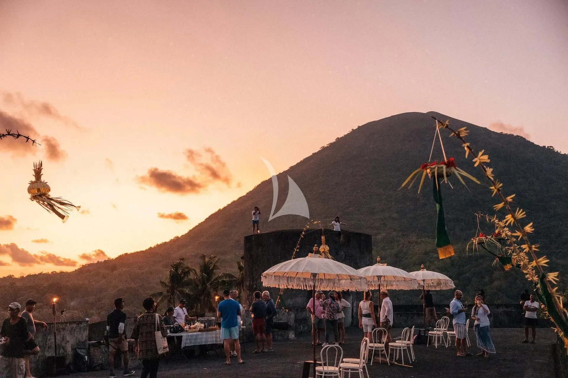 a group of people at a beach aboard KUDANIL EXPLORER Yacht for Sale