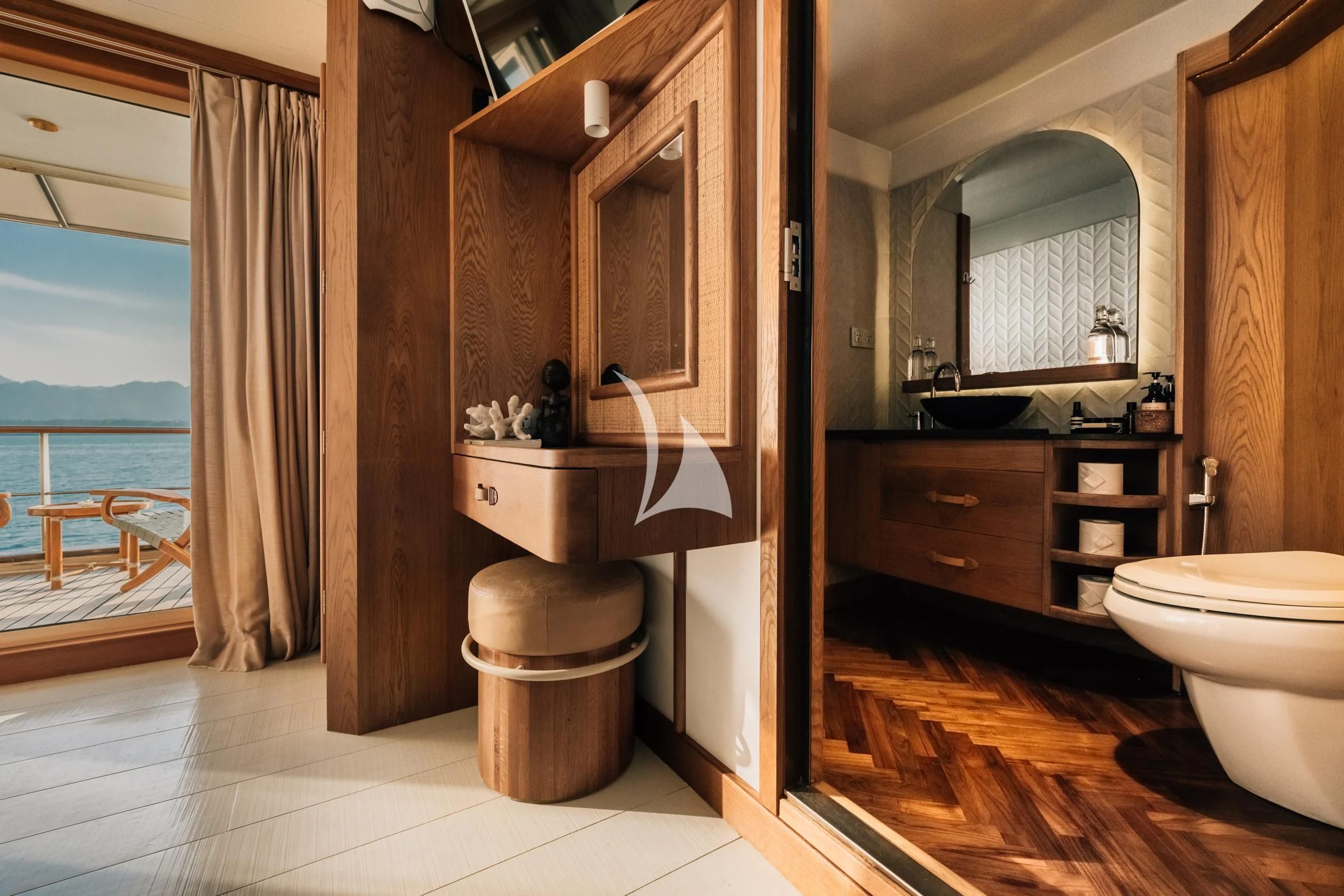 a bathroom with a large window aboard KUDANIL EXPLORER Yacht for Sale