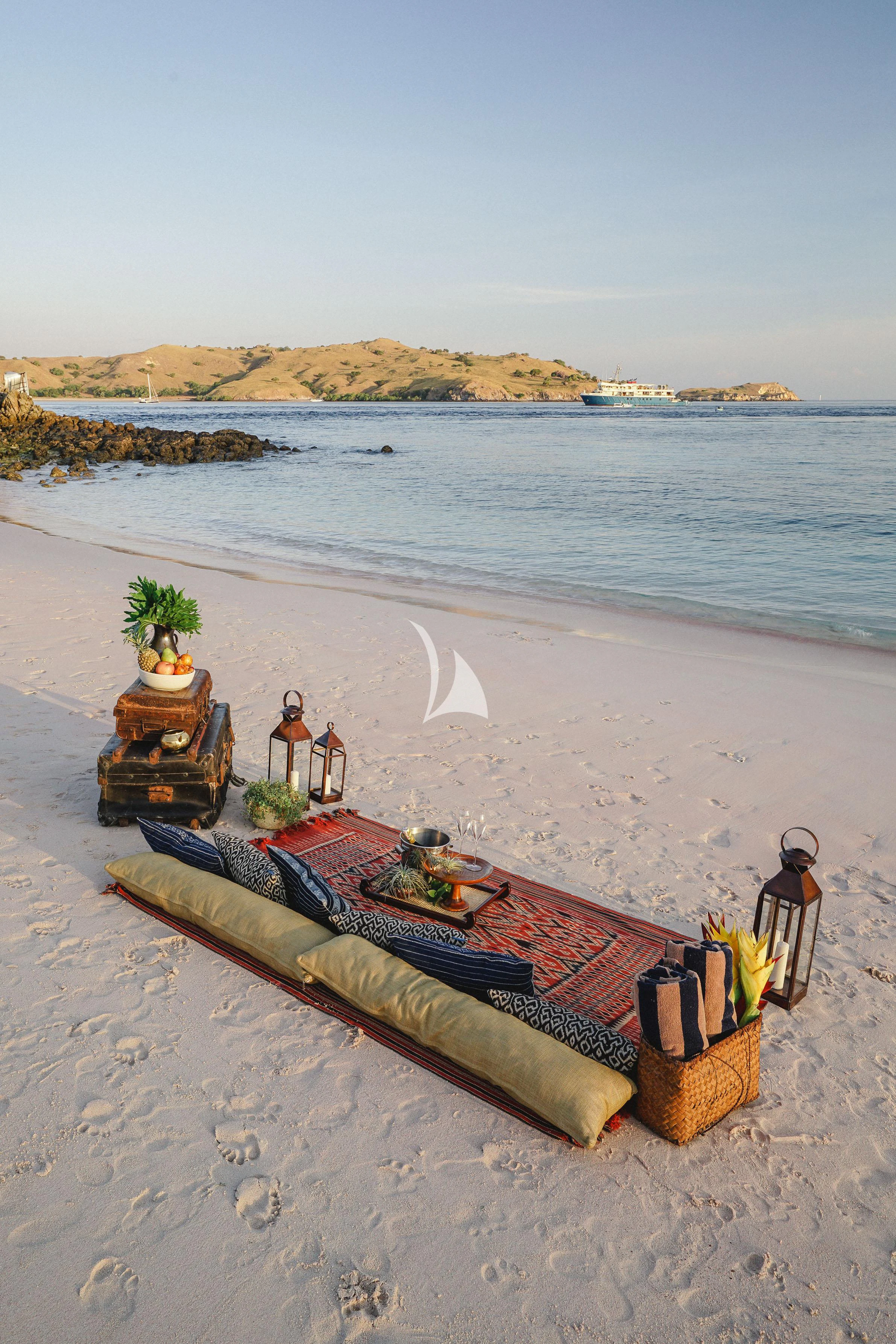 a couple of boats on a beach aboard KUDANIL EXPLORER Yacht for Sale