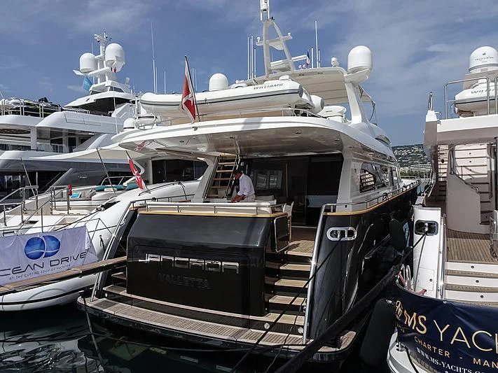a boat docked at a pier aboard MR. MAVERICK Yacht for Sale