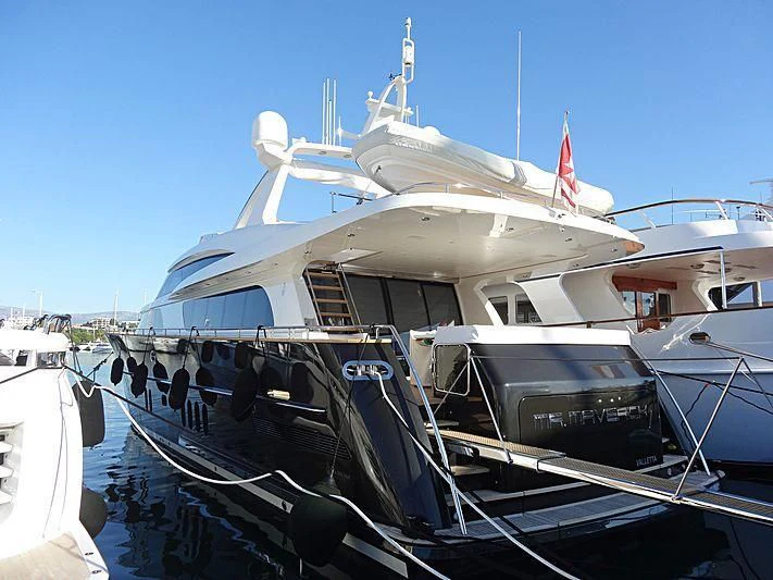 a boat docked at a pier aboard MR. MAVERICK Yacht for Sale