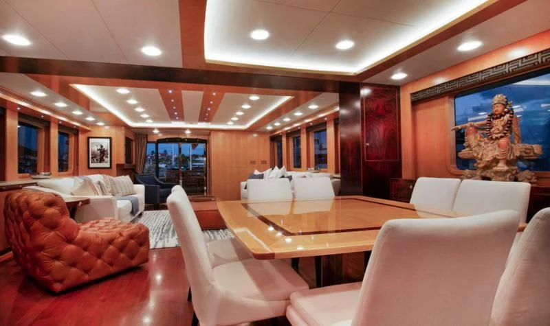 a large room with couches and tables aboard SALVATORE II Yacht for Sale