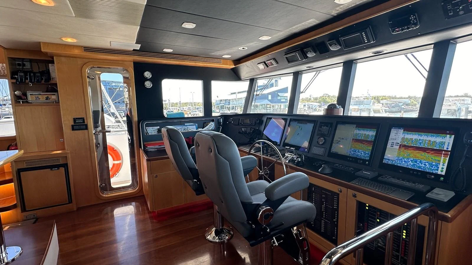 a room with computers and monitors aboard SALVATORE II Yacht for Sale