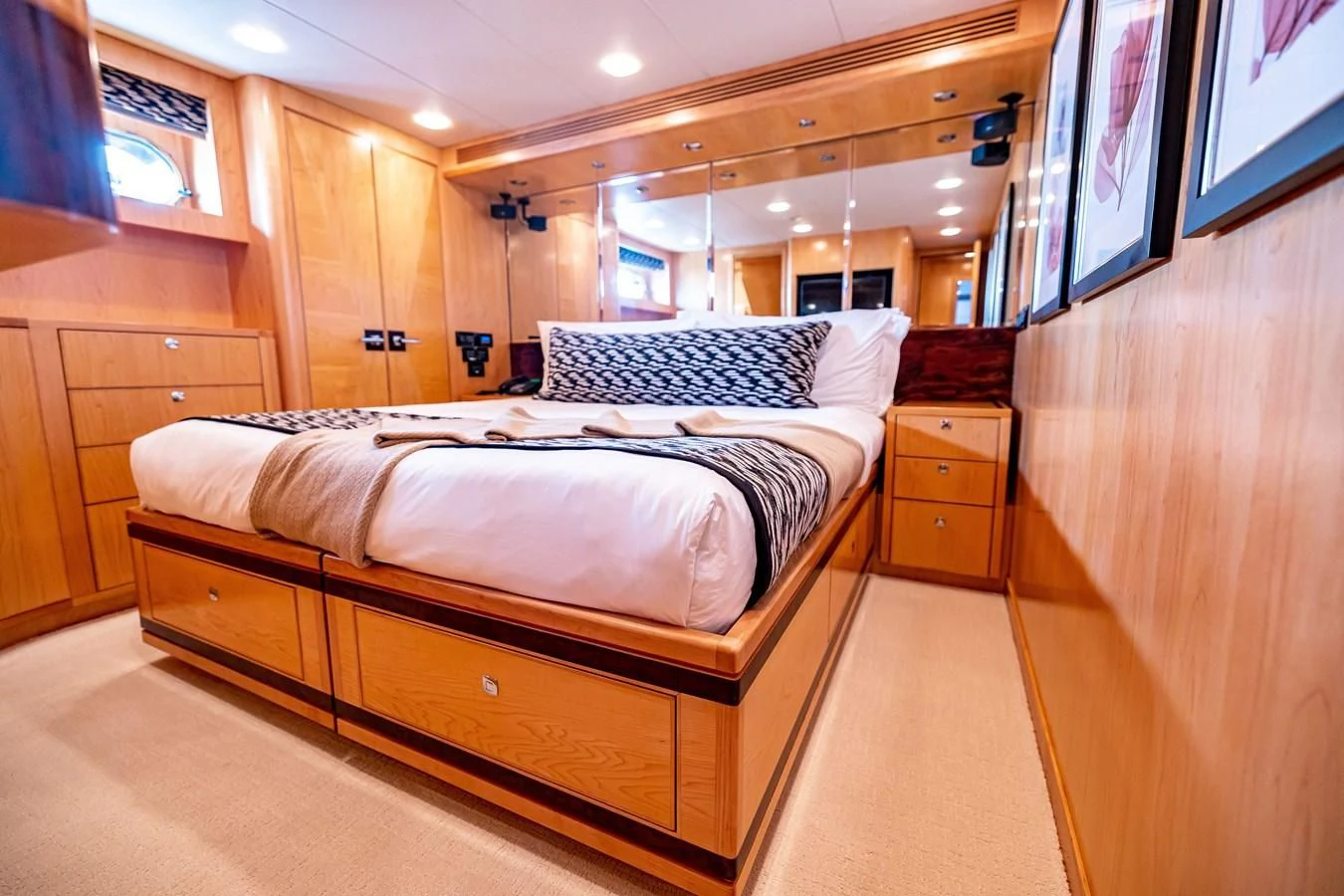 a room with a bed and a television aboard SALVATORE II Yacht for Sale