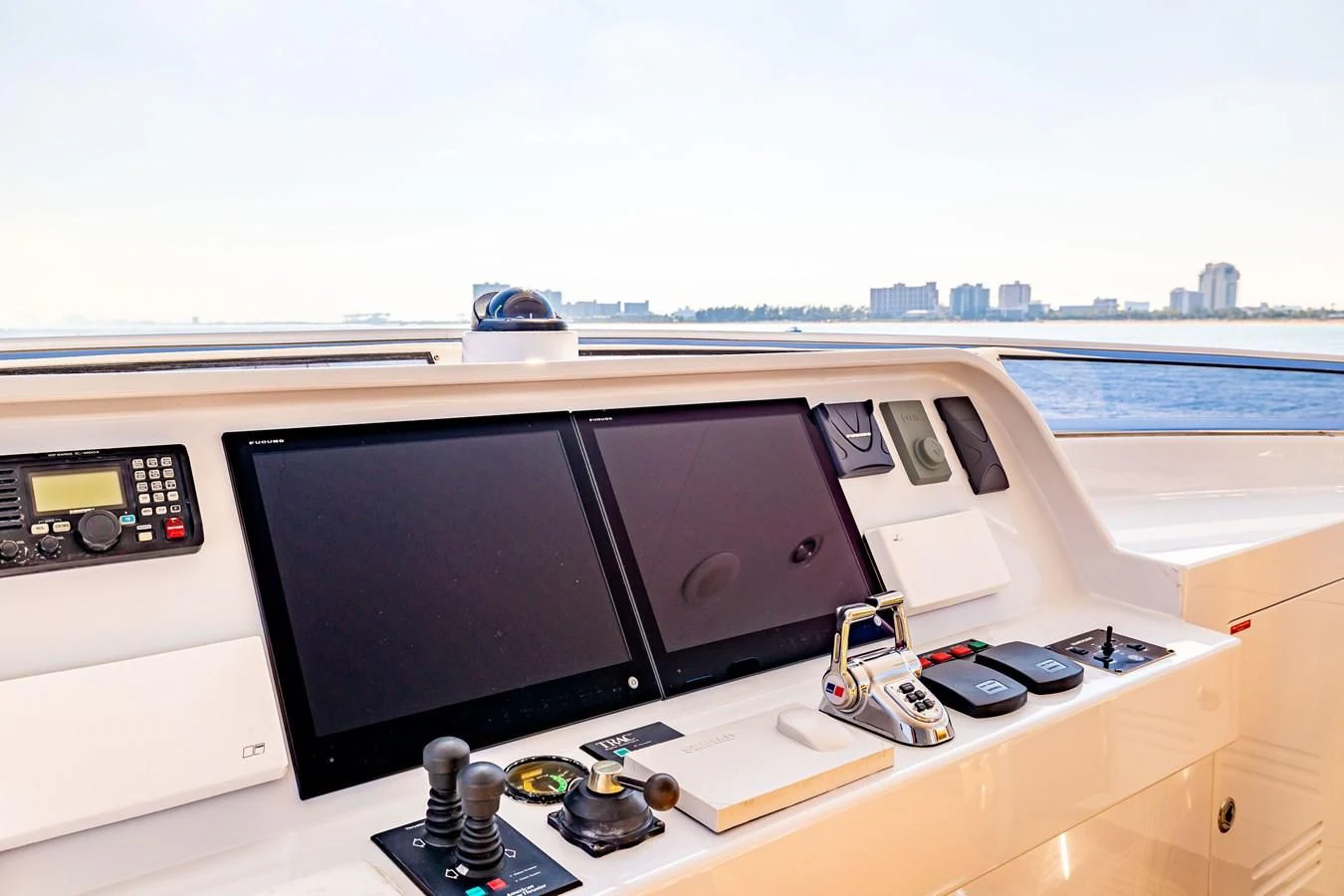 a desk with a computer and a keyboard on it aboard SALVATORE II Yacht for Sale