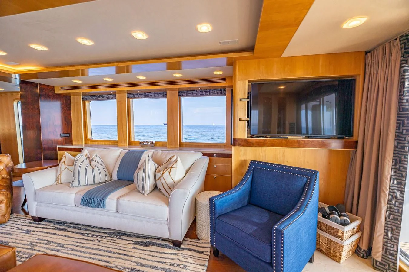 a living room with a couch and a chair aboard SALVATORE II Yacht for Sale