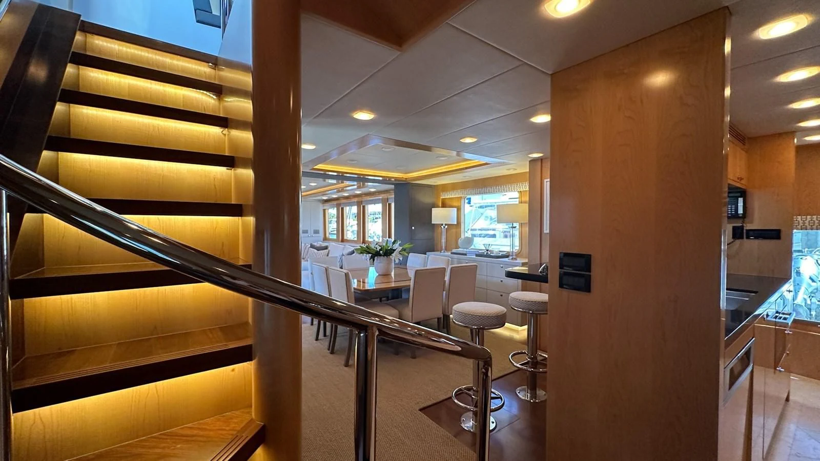 a room with a table and chairs aboard SALVATORE II Yacht for Sale