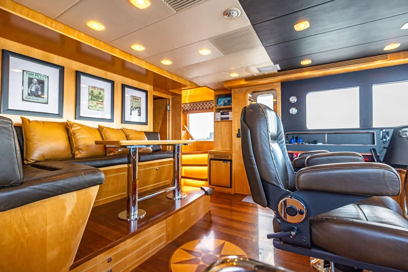 a living room with leather couches aboard SALVATORE II Yacht for Sale