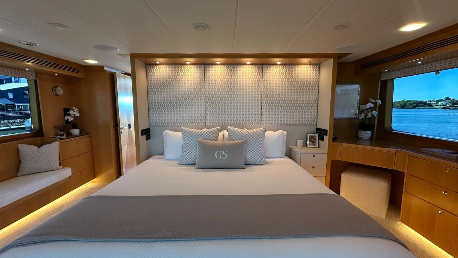 a bed with a white sheet aboard SALVATORE II Yacht for Sale