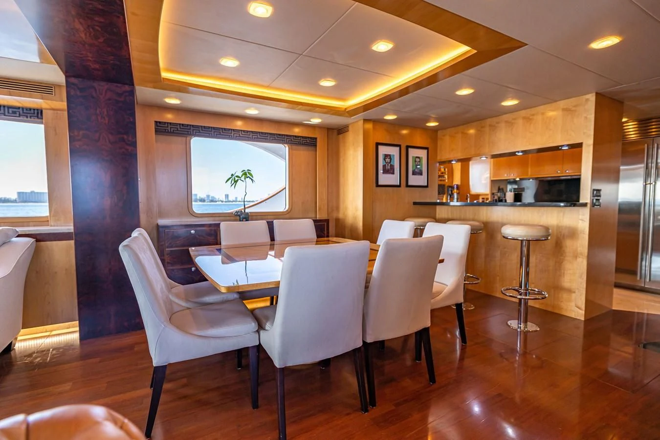a dining room with a table and chairs aboard SALVATORE II Yacht for Sale