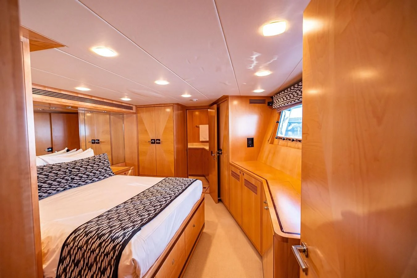 a room with a bed and a hallway aboard SALVATORE II Yacht for Sale