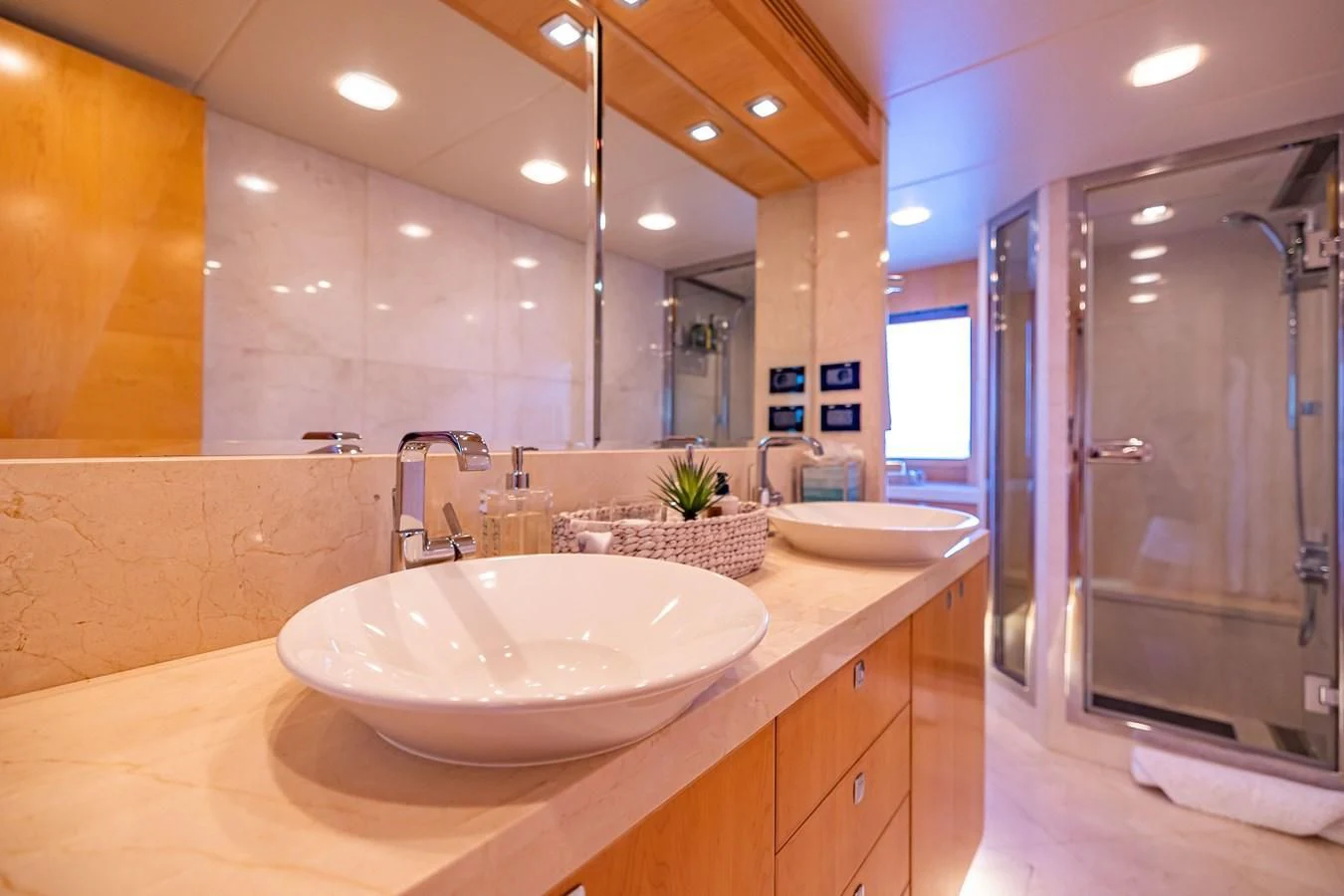 a bathroom with a large mirror aboard SALVATORE II Yacht for Sale