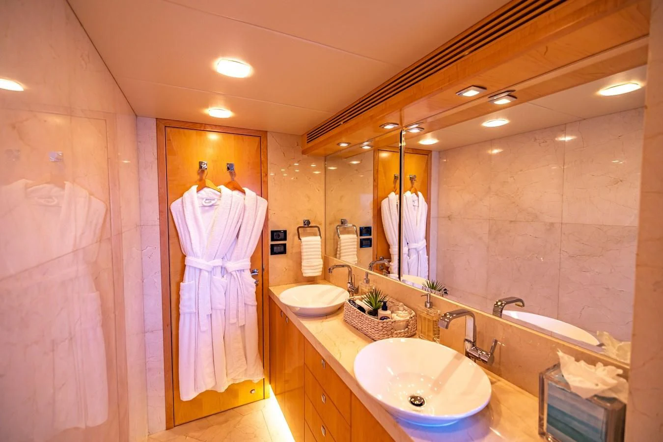 a bathroom with a large mirror aboard SALVATORE II Yacht for Sale