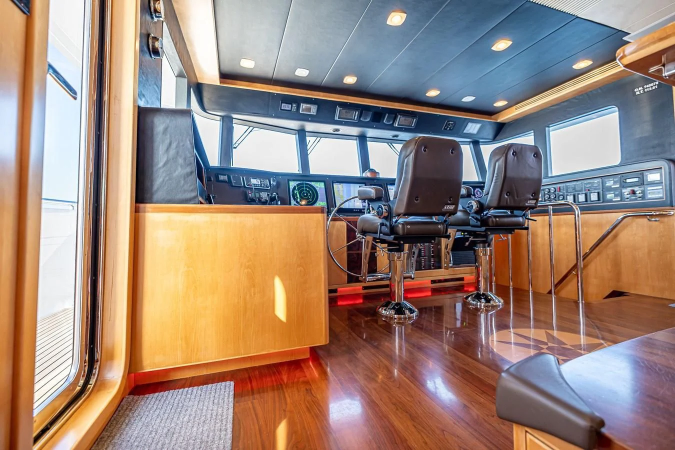 a room with a large desk and chairs aboard SALVATORE II Yacht for Sale