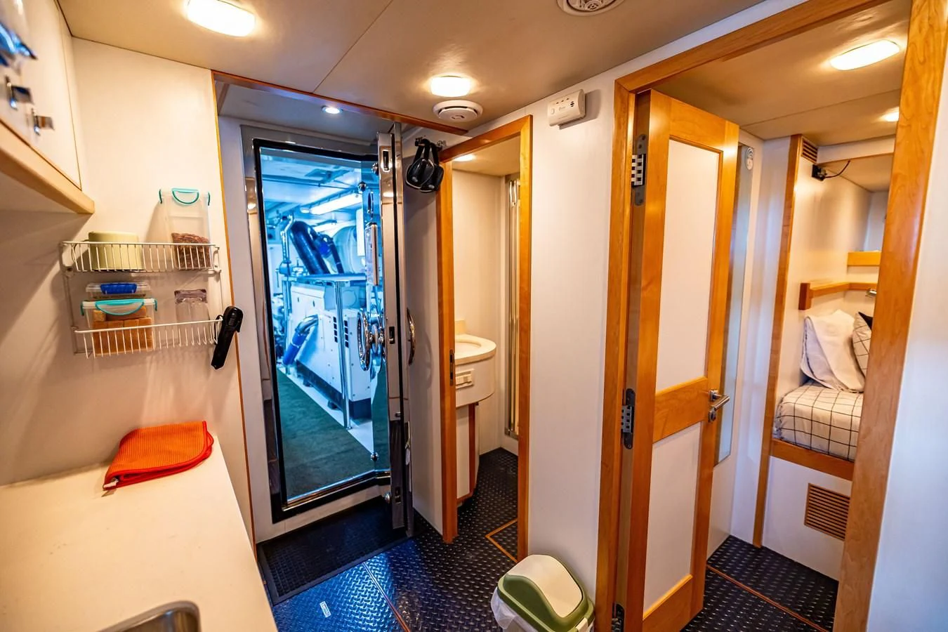 a bathroom with a blue rug aboard SALVATORE II Yacht for Sale