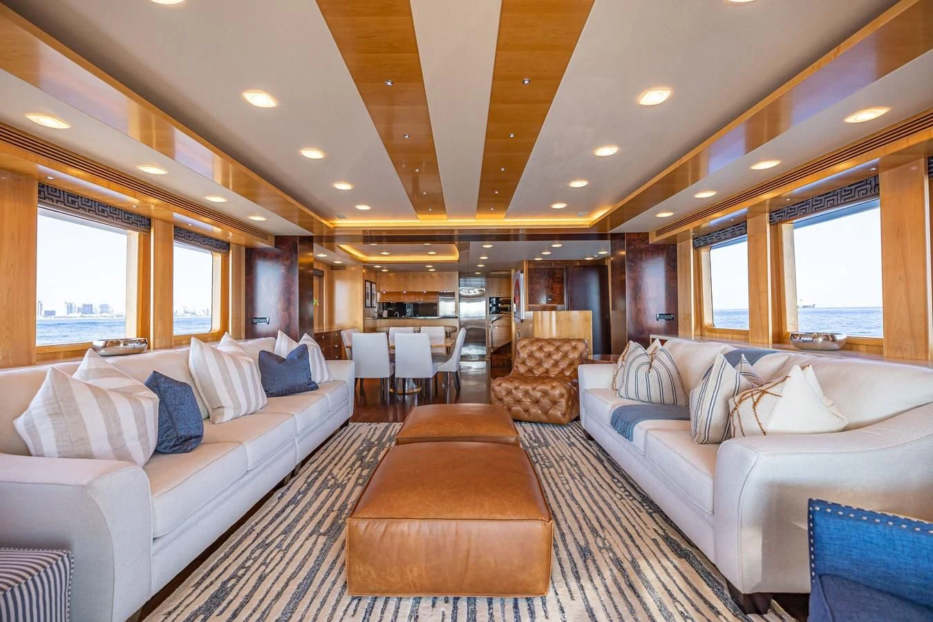a large living room with a large bed and a couch aboard SALVATORE II Yacht for Sale