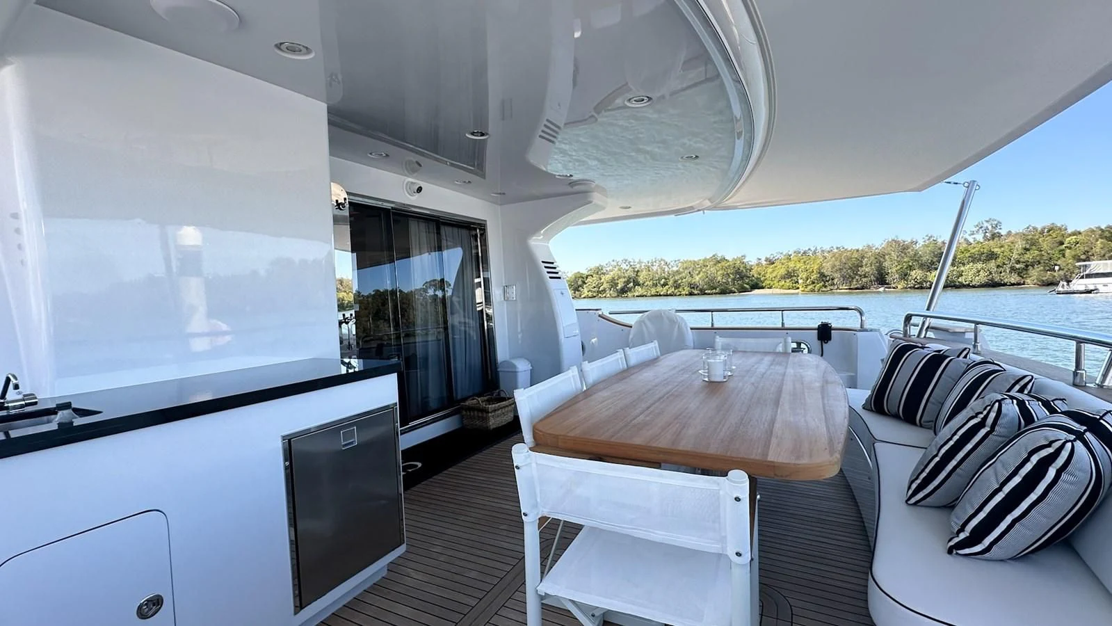 a boat with a table and chairs aboard SALVATORE II Yacht for Sale