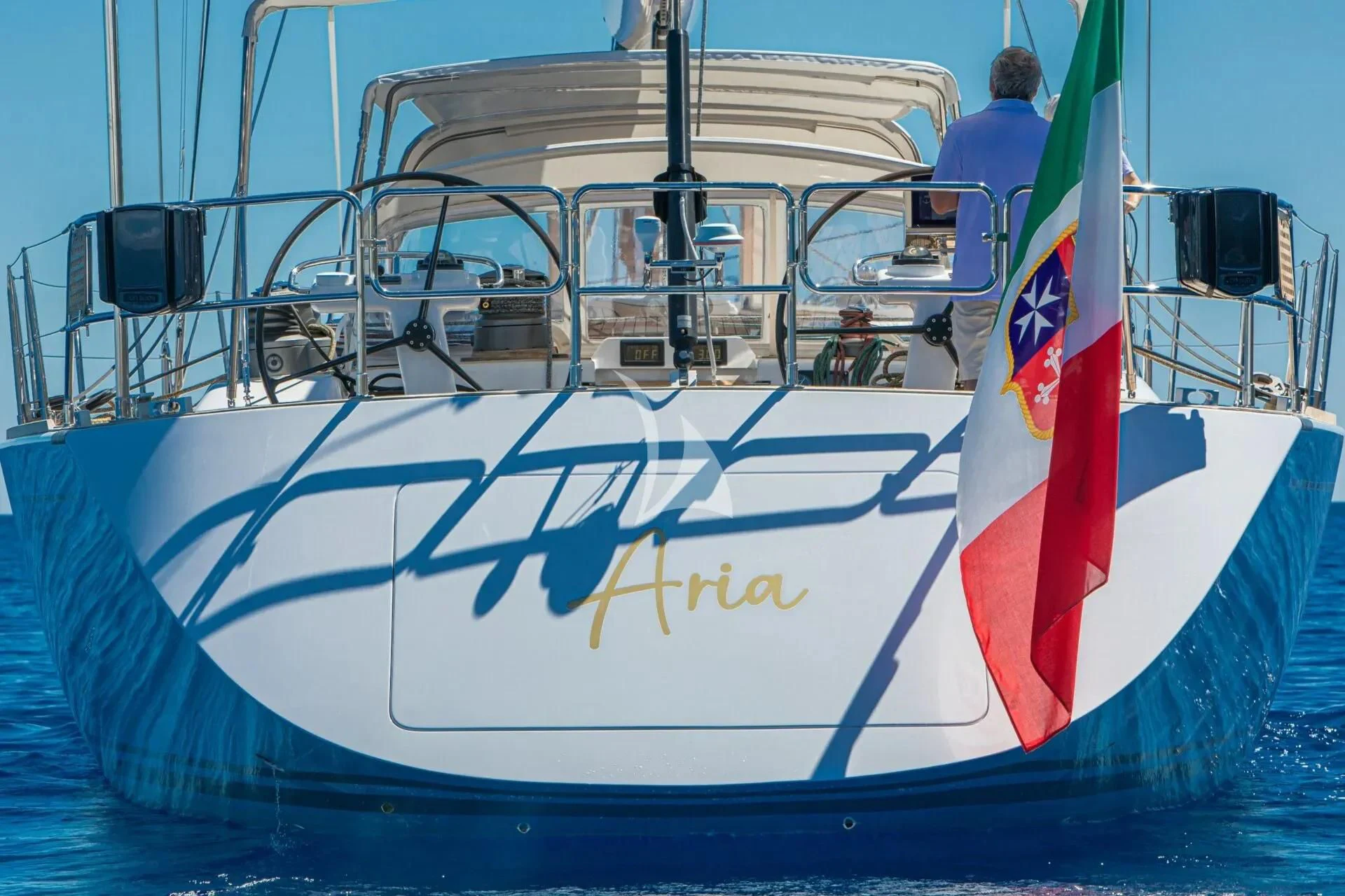 a boat with a surfboard aboard ARIA Yacht for Charter