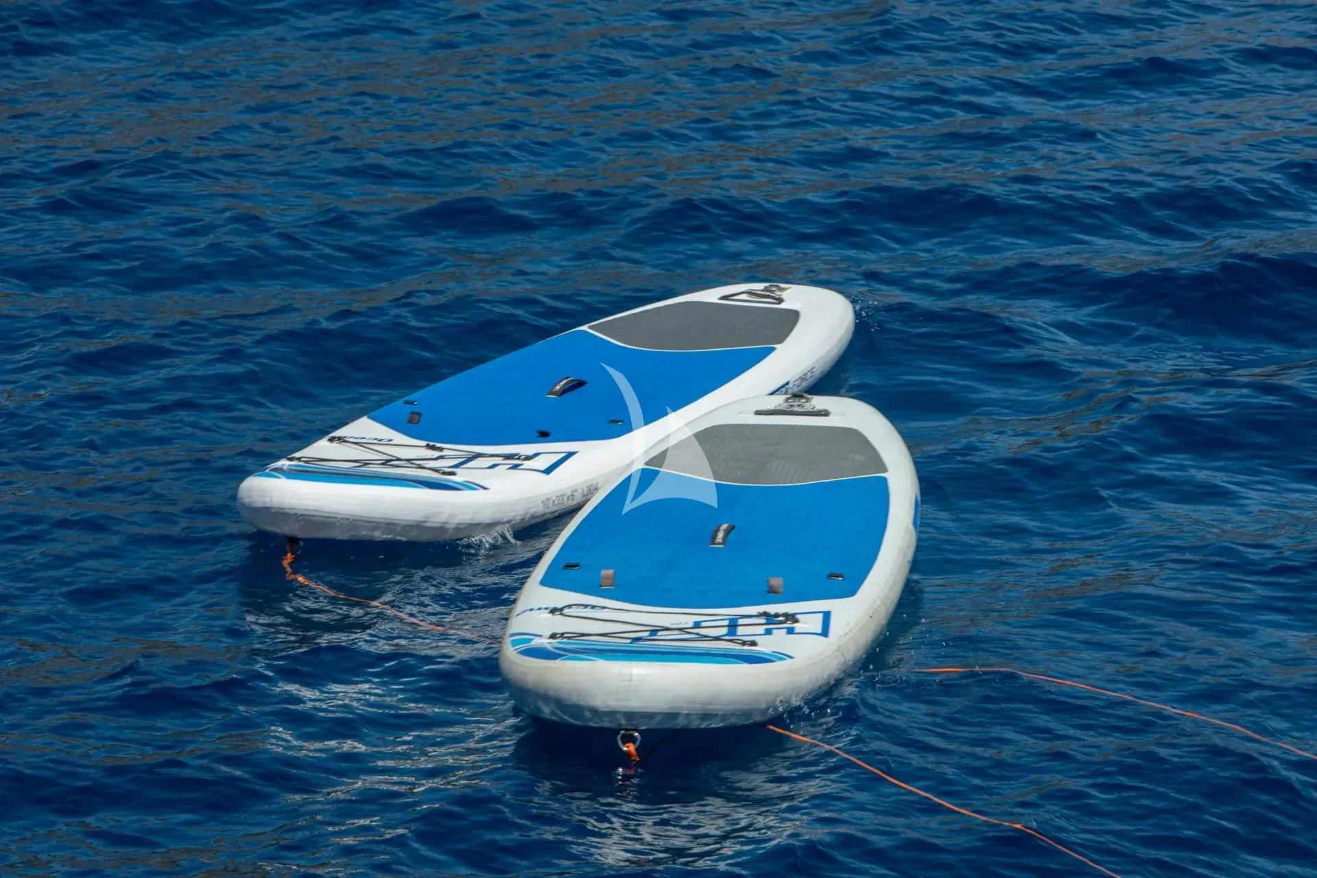 a white boat in the water aboard ARIA Yacht for Charter
