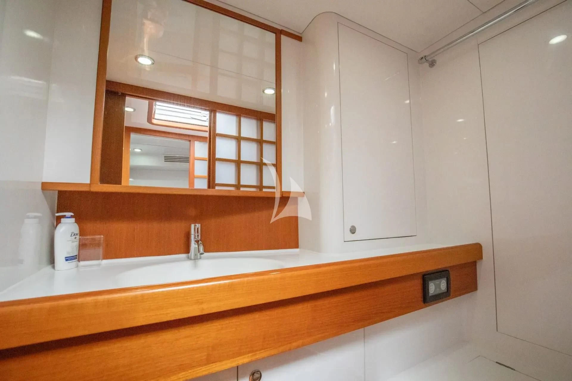 a bathroom with a countertop aboard ARIA Yacht for Charter