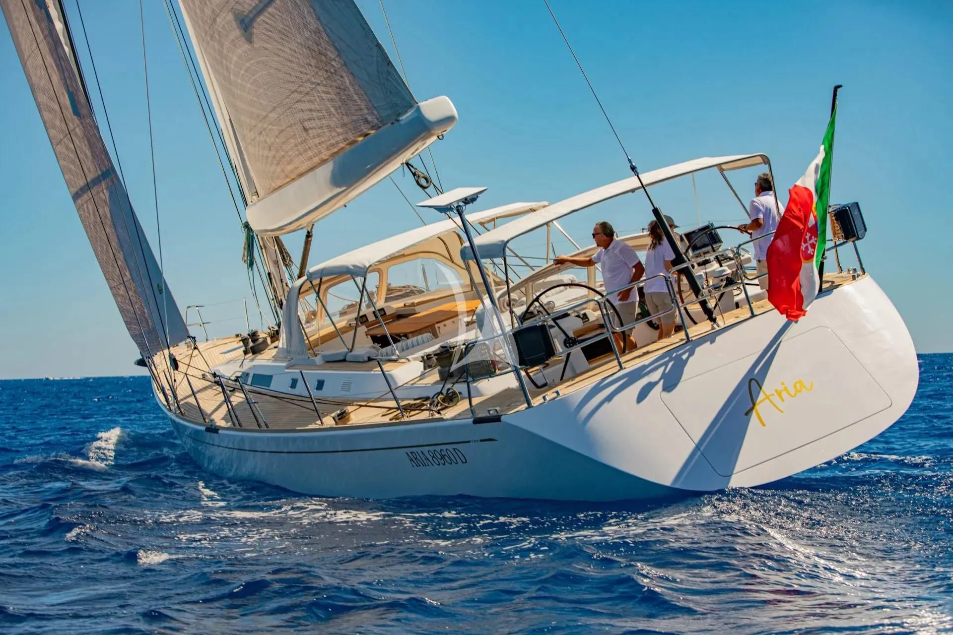 a boat sailing on the sea aboard ARIA Yacht for Charter