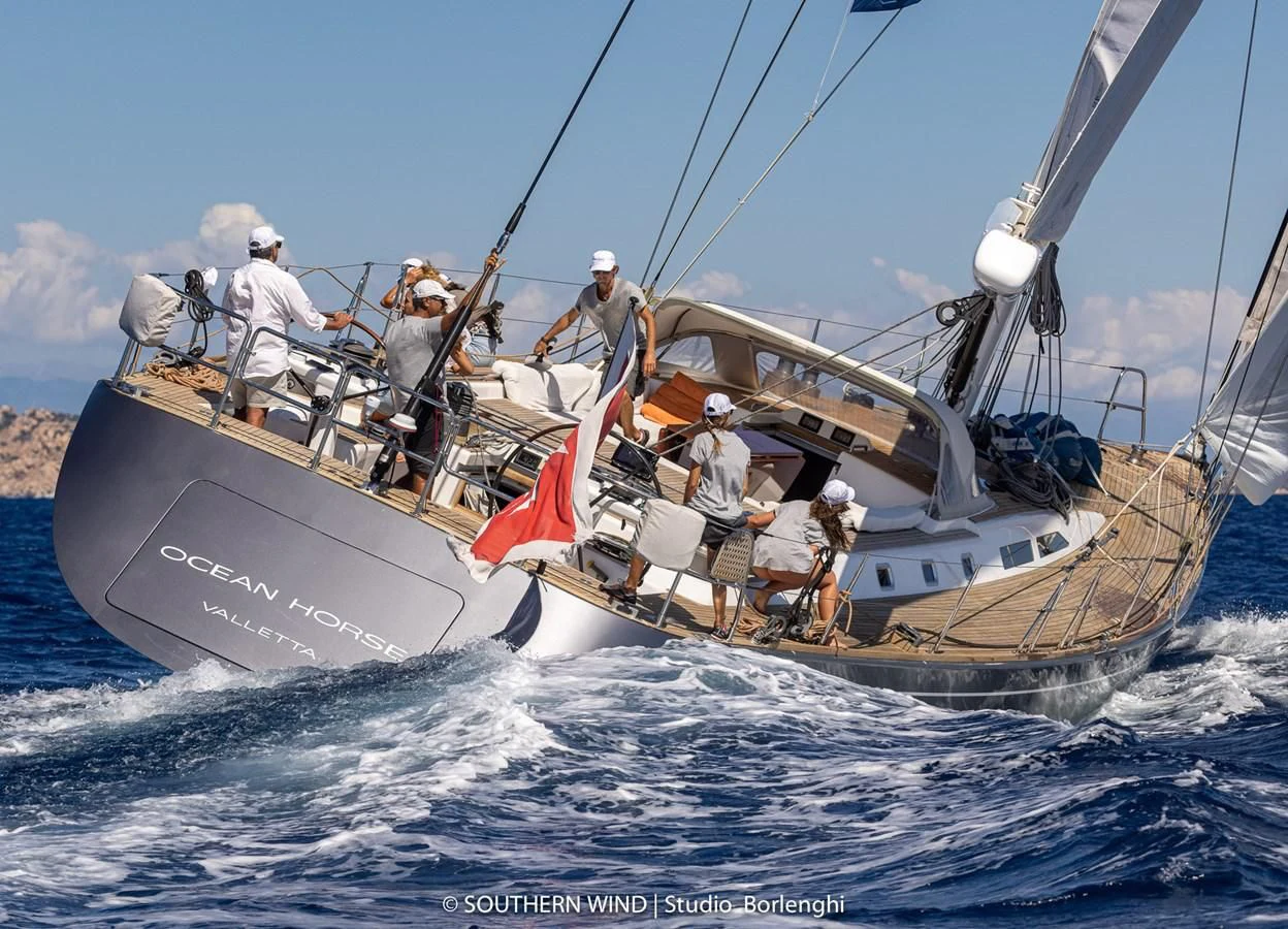 a group of people on a boat aboard ARIA Yacht for Charter