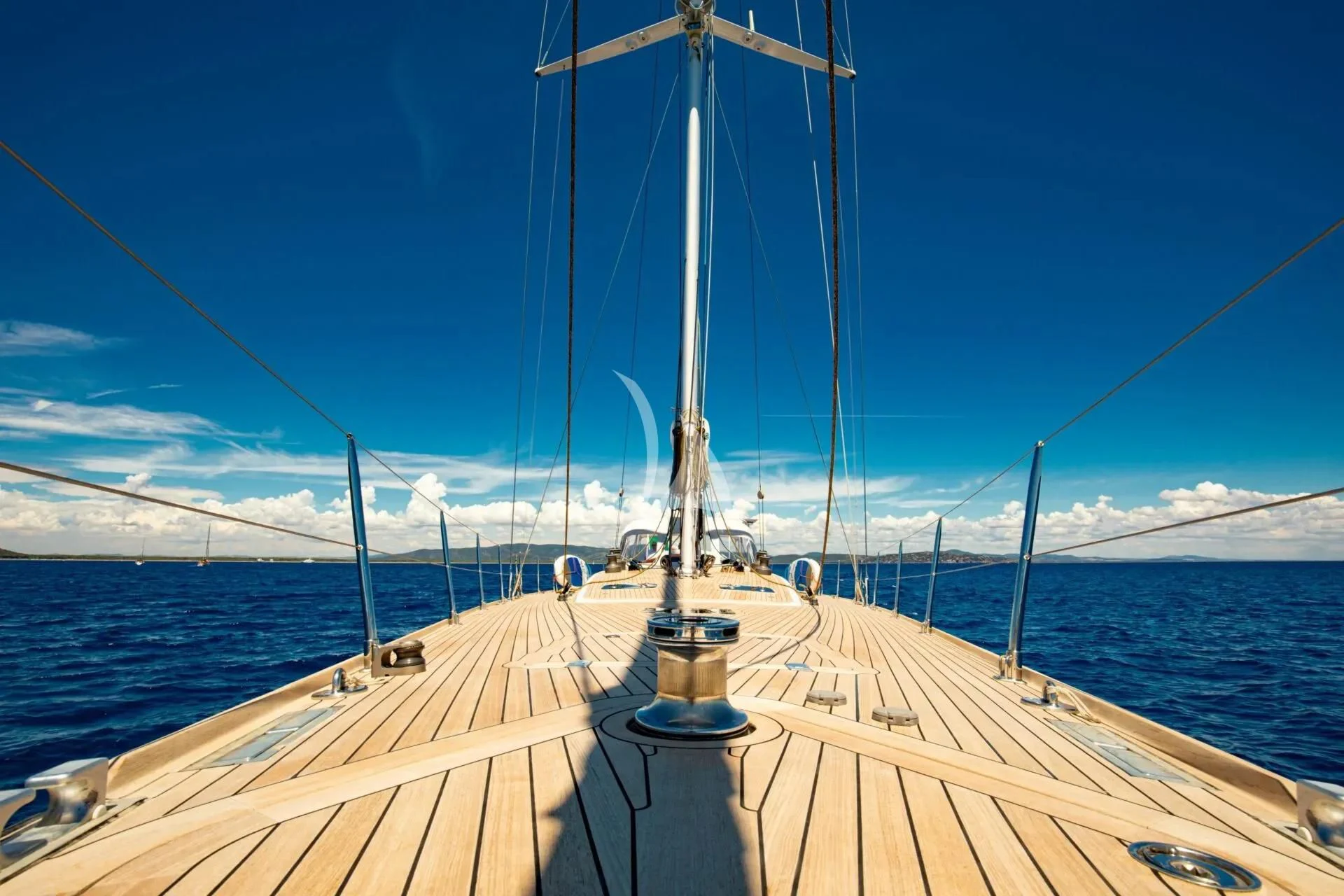 a wooden bridge over water aboard ARIA Yacht for Charter