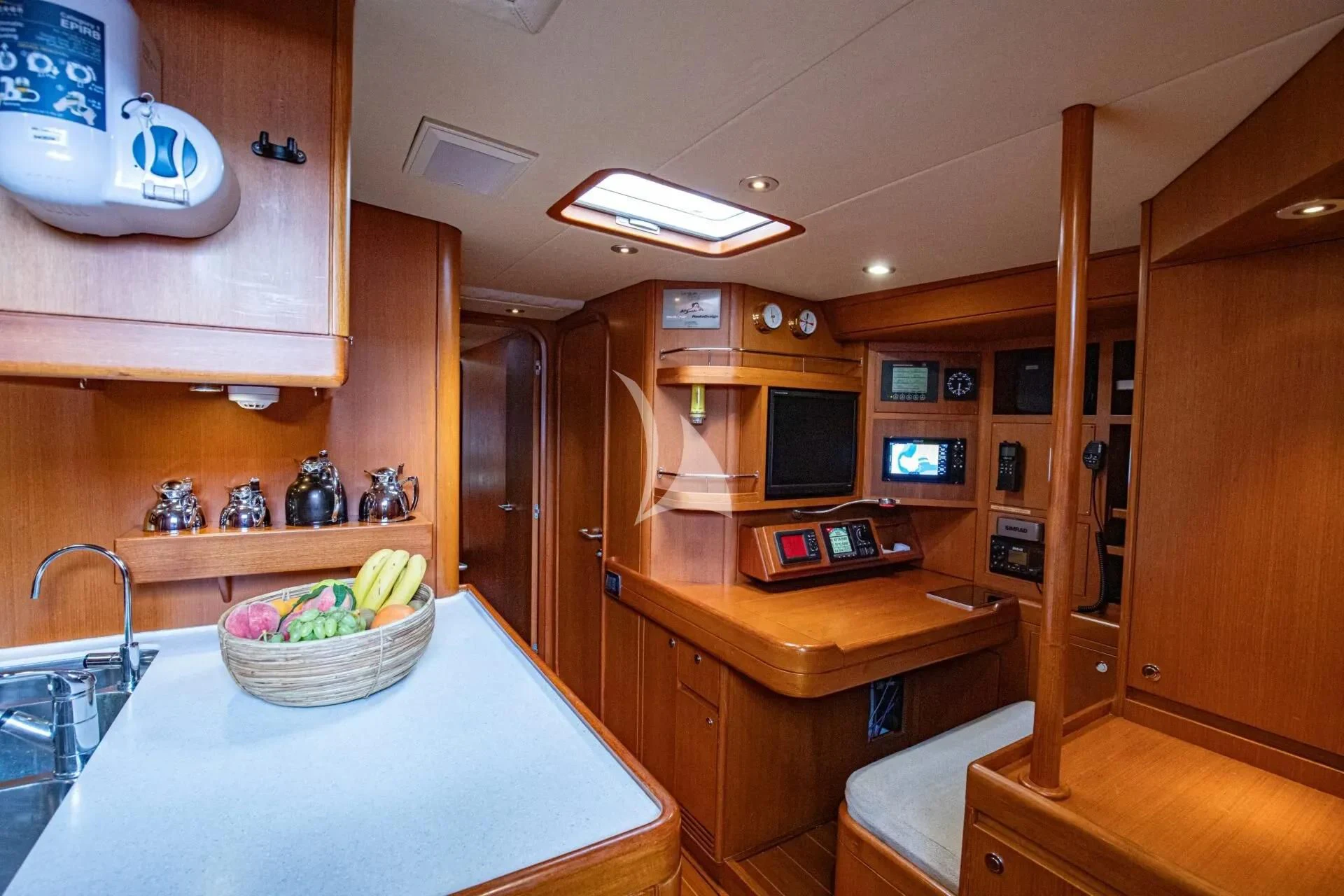 a kitchen with a counter and a sink aboard ARIA Yacht for Charter